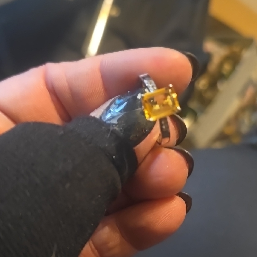 Elegant Silver Ring with Yellow Gemstone